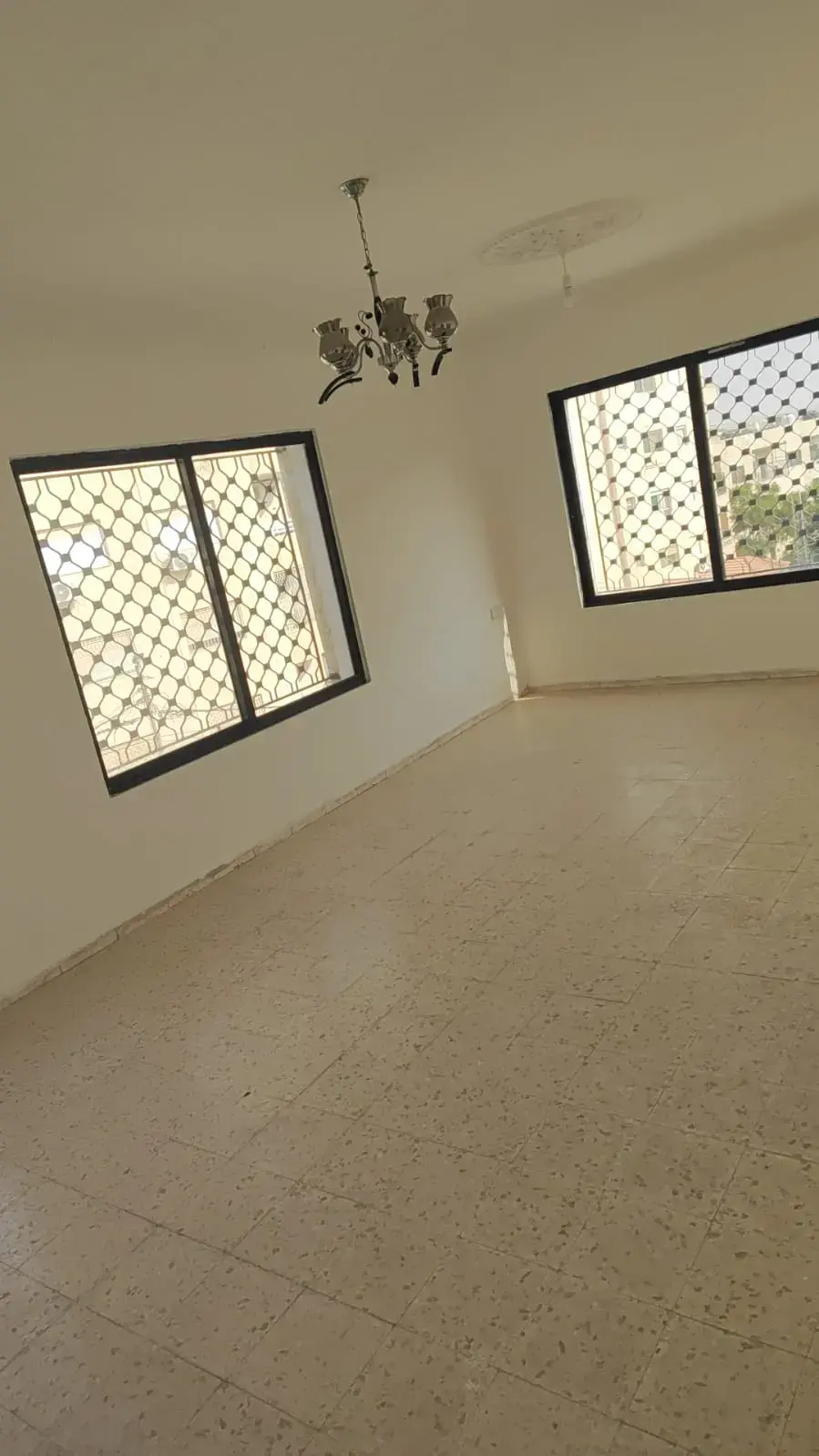 3-bedroom apartment for rent on 16th Street, New Zarqa, with guest room and balcony