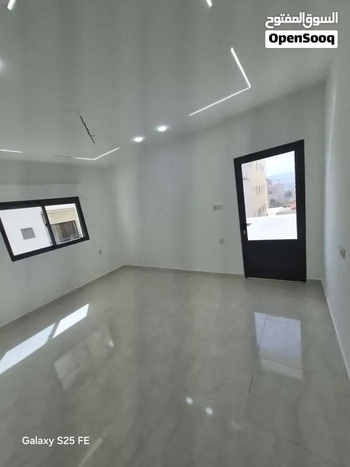 New super deluxe apartment with tiled terrace for sale in Al Sakaneyeh 9