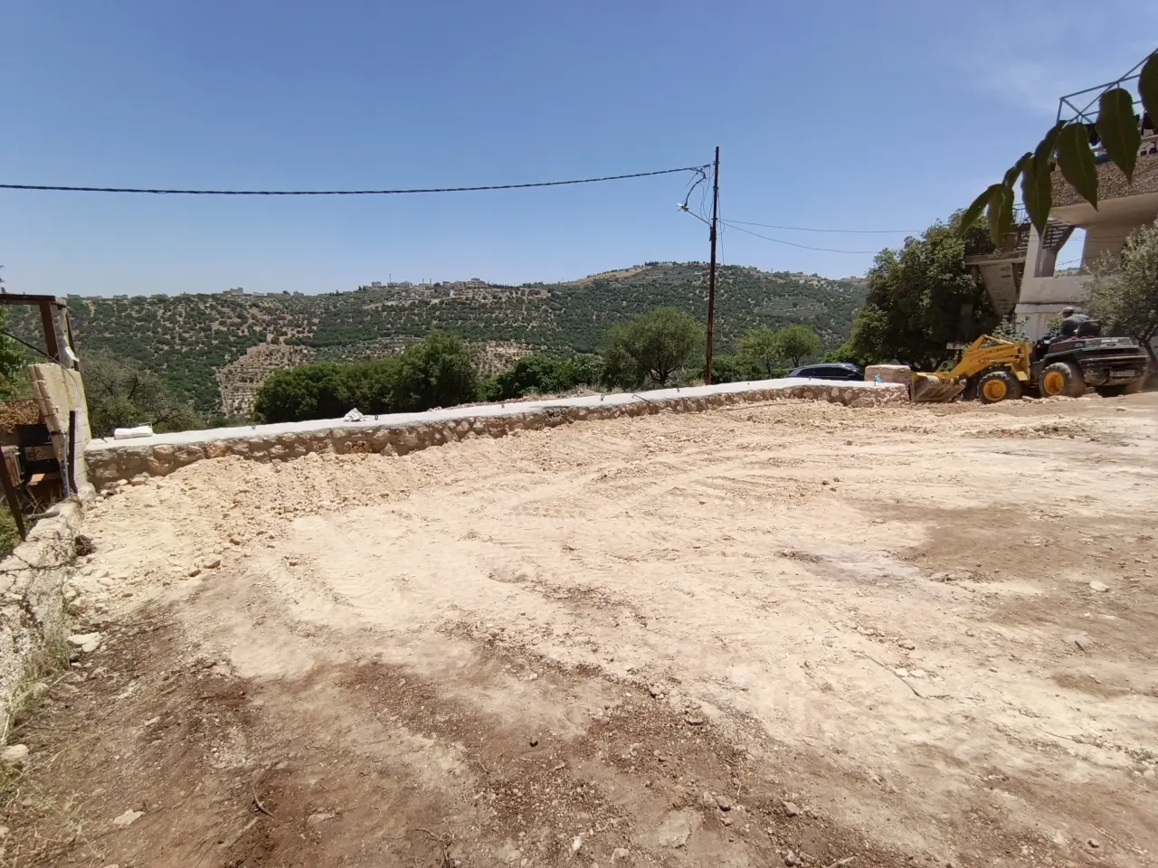 Ready-to-build level half-dunum in Um Jozeh, forest view over Abu Nsair