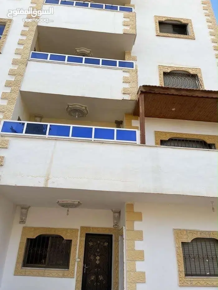 123 m² semi-ground apartment with large side garden for sale in Al-Thaniyyah, Karak