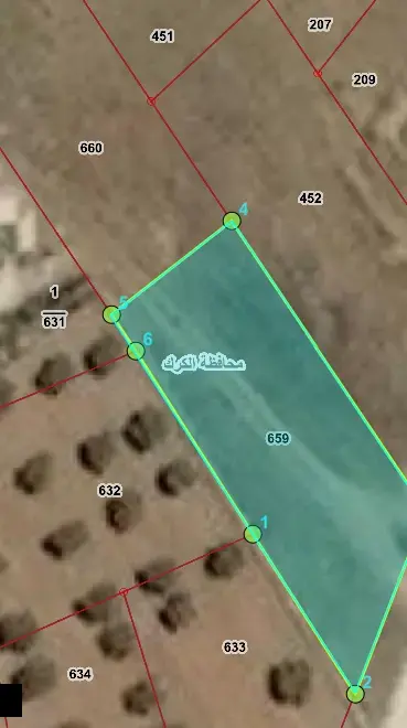 830 m² residential plot for sale in Madyan, Karak, on University Street