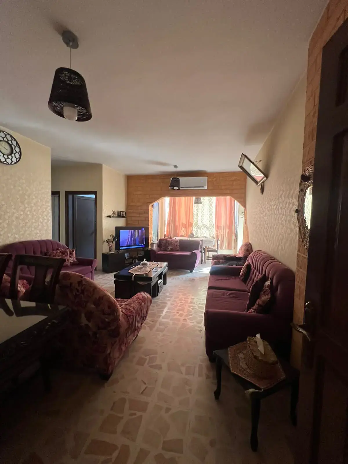 Sunny three-bedroom third-floor apartment for sale in Al Thera'a Al Gharbi