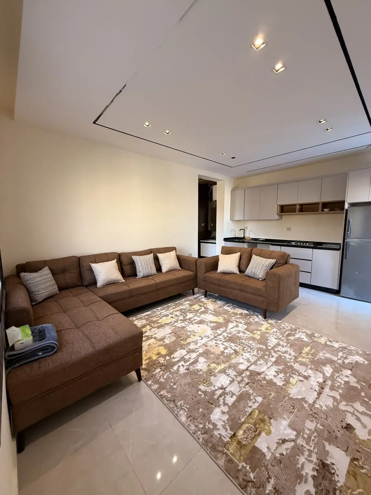 Furnished rooftop apartment with a large terrace for rent near Airport Road, Dahiet Al Ameer Ali
