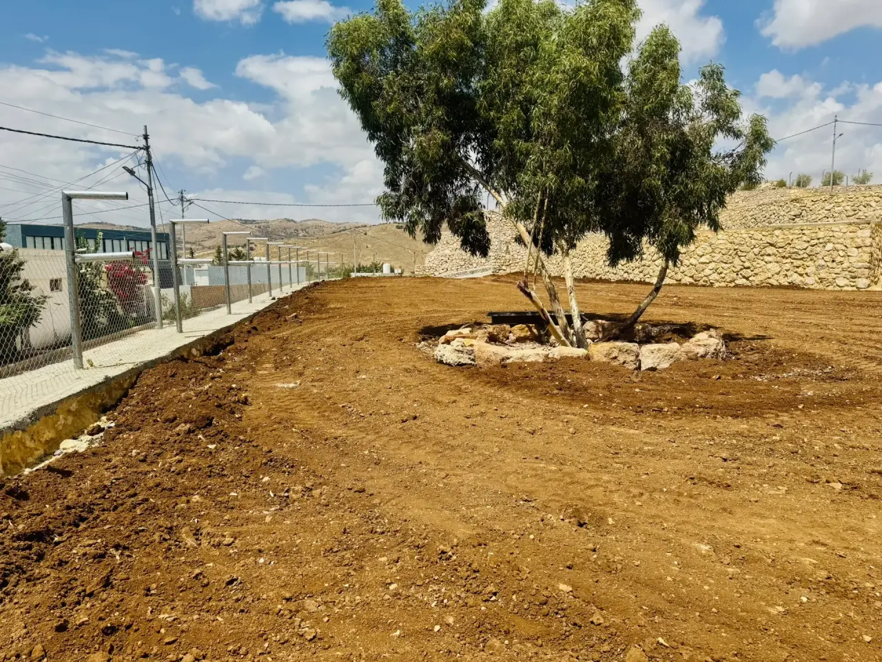 3,700 m² plot for sale in Mahes, Umm Al-Khal basin, on three streets among farms and chalets