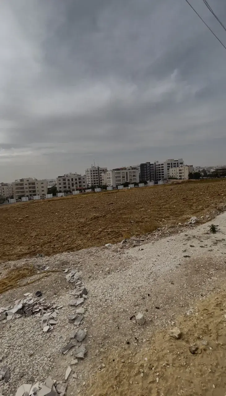1,400 m² plot on two streets for sale in Deir Ghbar, suited to a housing project