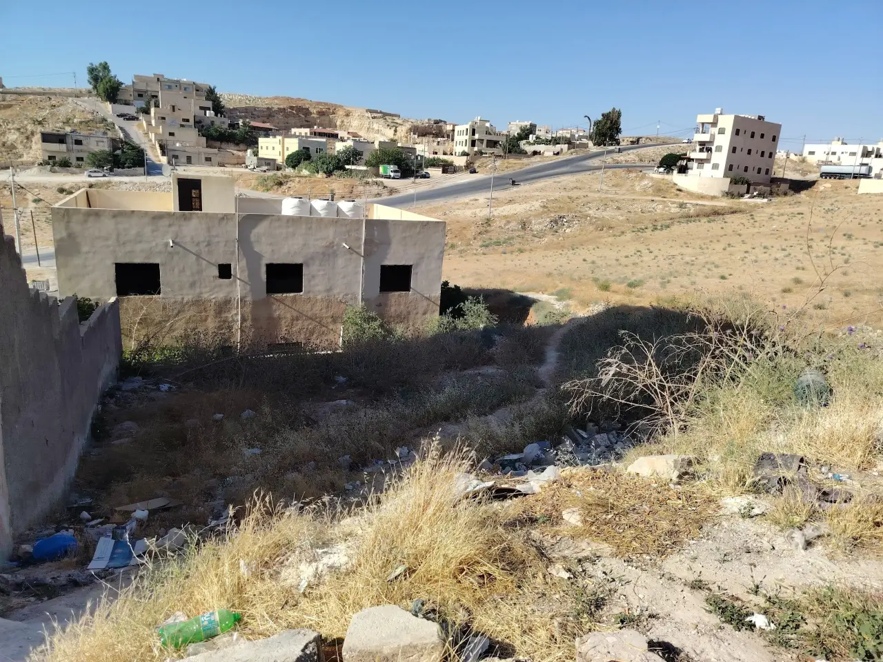 317 m² plot for sale in Al-Mugairat in a residential street next to a mosque