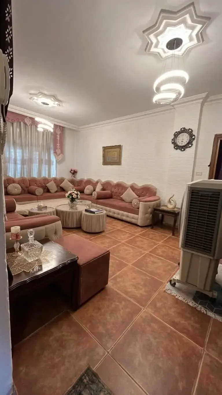Ground-floor apartment with yard and two-car garage for sale between Swaileh and Al Kamaliya