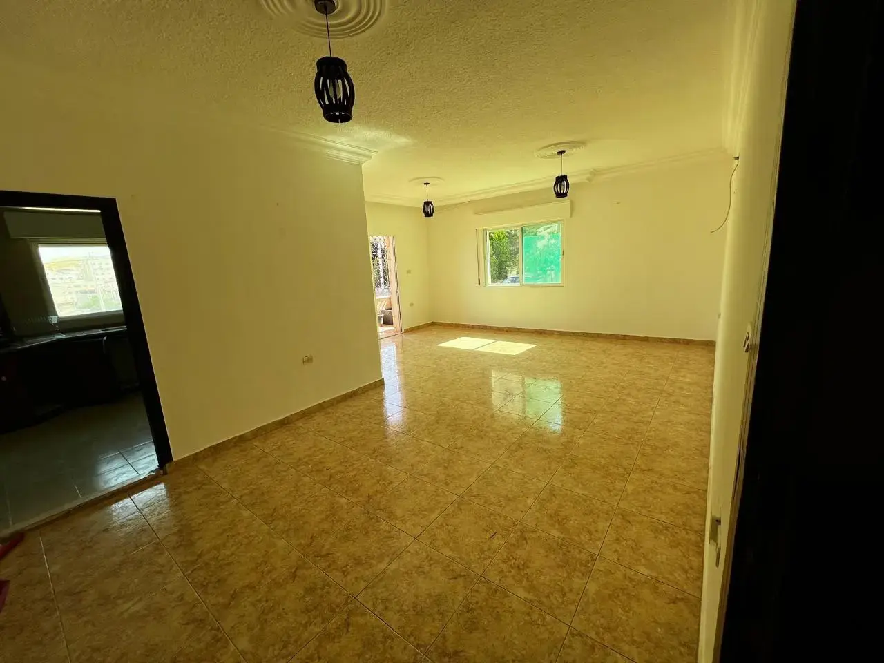 Raised ground-floor 3-bedroom apartment near Iqraa roundabout, Dahyet Al Rasheed