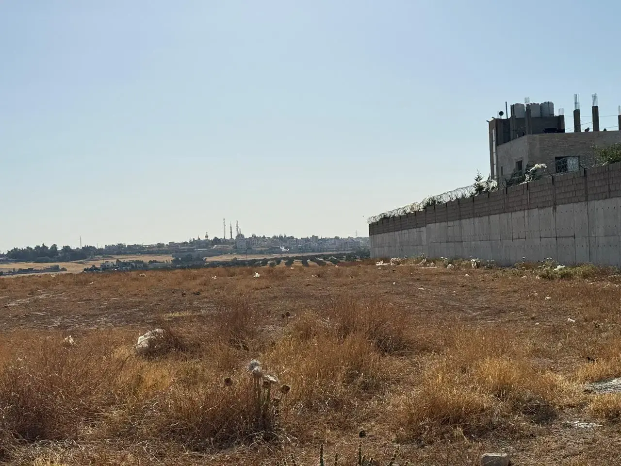10-dunum industrial plot in Al Qastal on a 12 m street