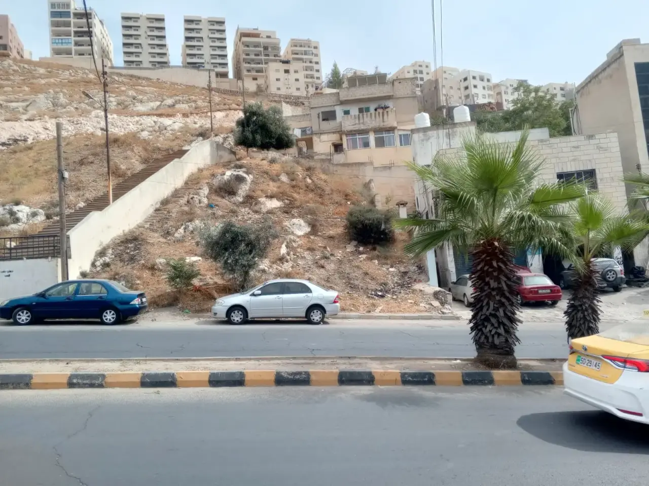 Commercial land on Wadi Al Seer main street towards Al Bayader, 371 m²