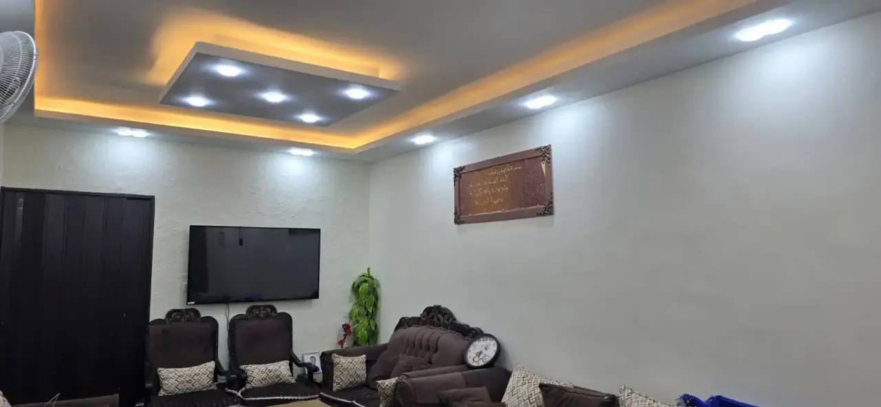 Private yard and an outdoor room come with this Madinet El Sharq apartment for sale