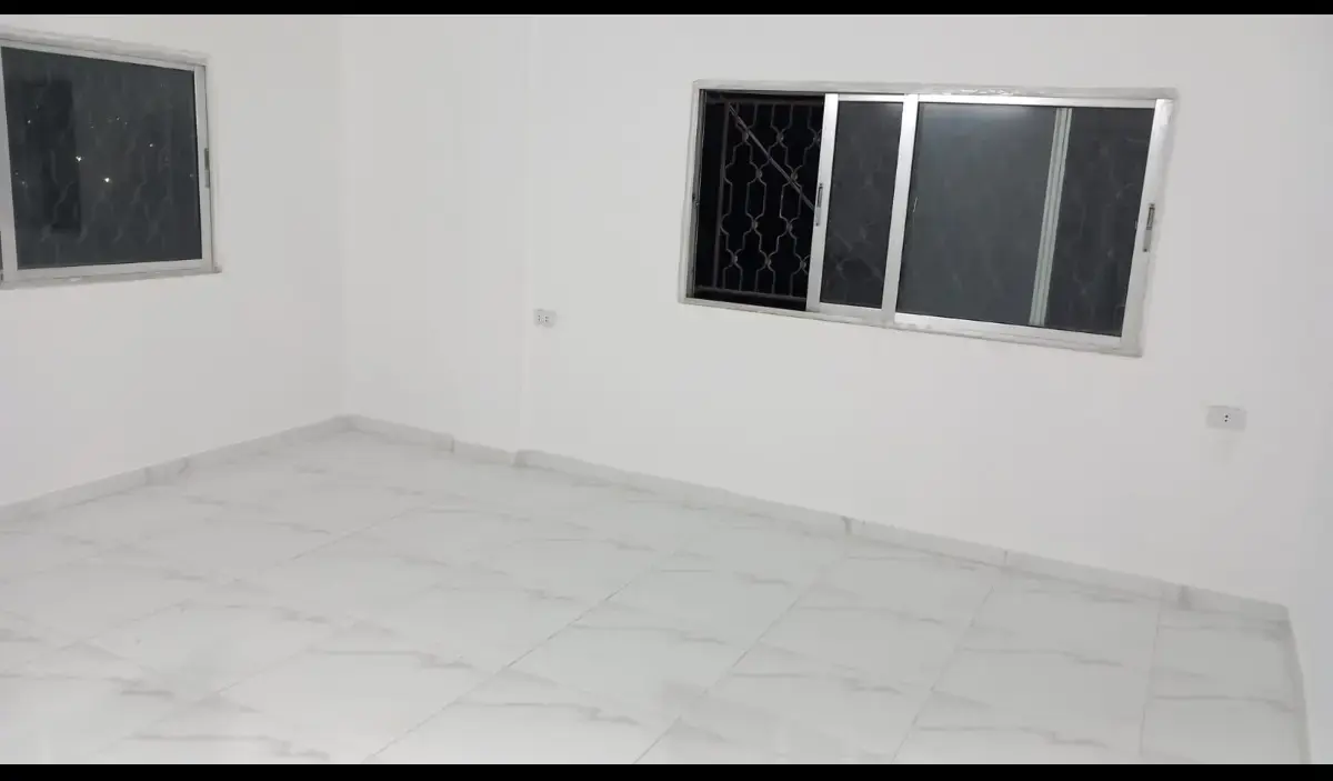 Past Khamis roundabout in Al Zawahra, Zarqa: newly finished 1-bedroom flat for rent