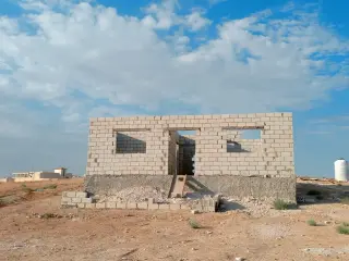 Land for sale in Al Mowaqar