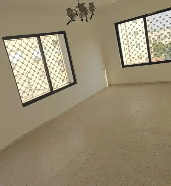 3-bedroom apartment for rent on 16th Street, New Zarqa, with guest room and balcony