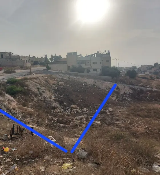 821 m² residential plot in Bait Ras on two streets