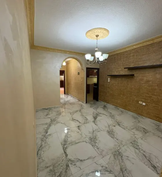 Two entrances on a 153 m² ground-floor flat in Dahyet Al Ameer Hasan, for sale