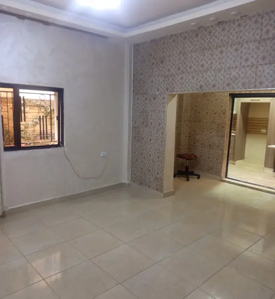 Ground-floor 3-bedroom apartment with garden and parking for rent behind Al Yarmouk Club