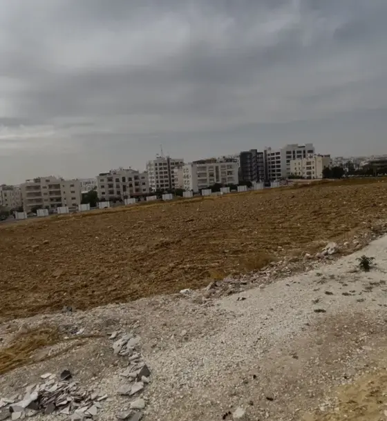 1,400 m² plot on two streets for sale in Deir Ghbar, suited to a housing project