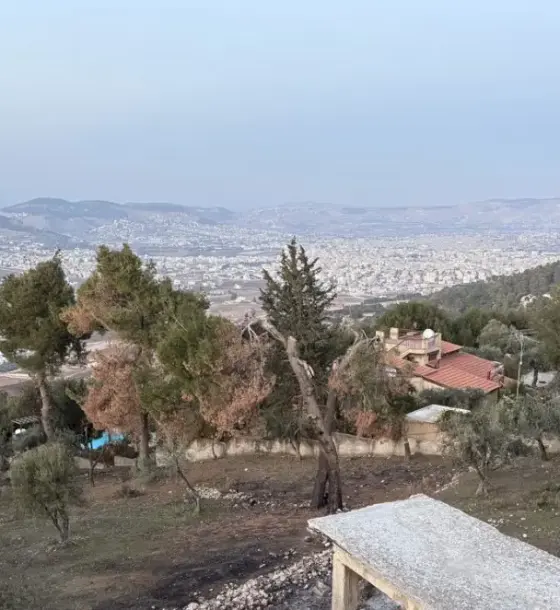 Walled 4-dunum Residential A plot for sale in Al Kamaliya with 50 olive trees and a view over Baqaa