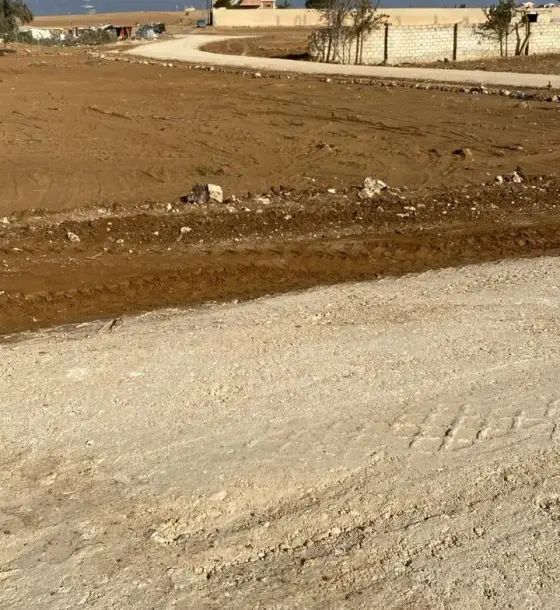 3,400 m² farm plot on two streets for sale in Areinba Al Gharbiyah on the Desert Highway