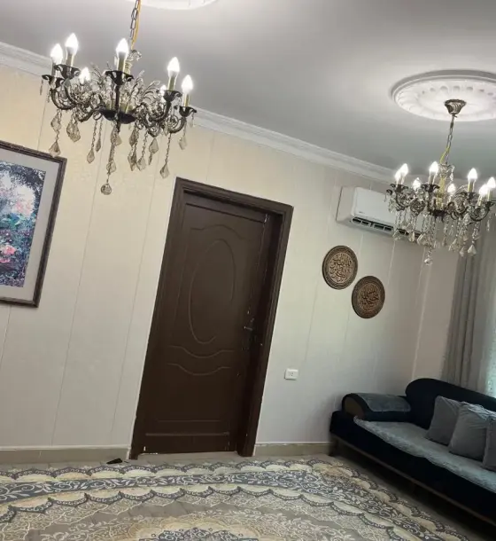 135 m² garden-level apartment with 100 m² yard and fountain for sale, Iskan Al Atiba', Irbid