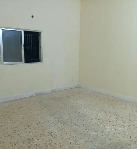 Unfurnished 3-bedroom ground-floor apartment for rent near the Aghwaar complex, Irbid