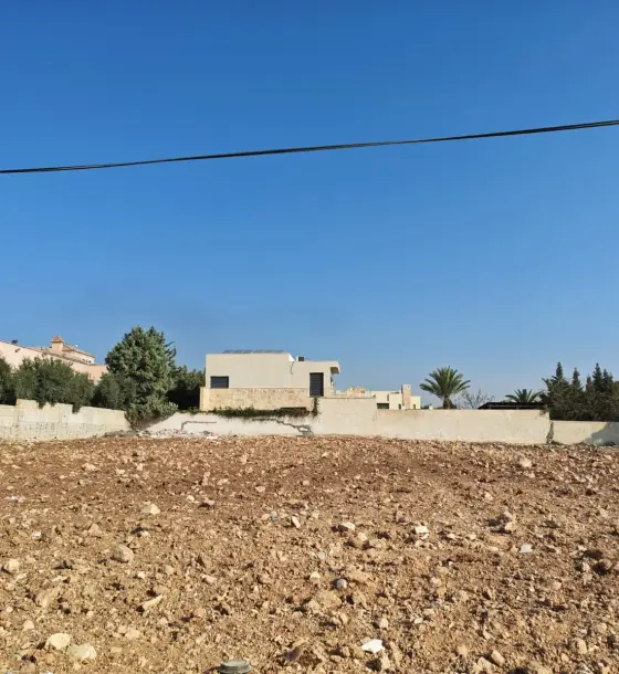 2,281 m² residential plot among villas off Airport Road (Al Ghabiya)