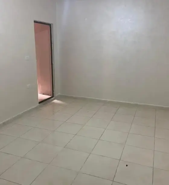 Lower-floor apartment with 120 m² private yard for sale in Dahiet Al-Istiqlal