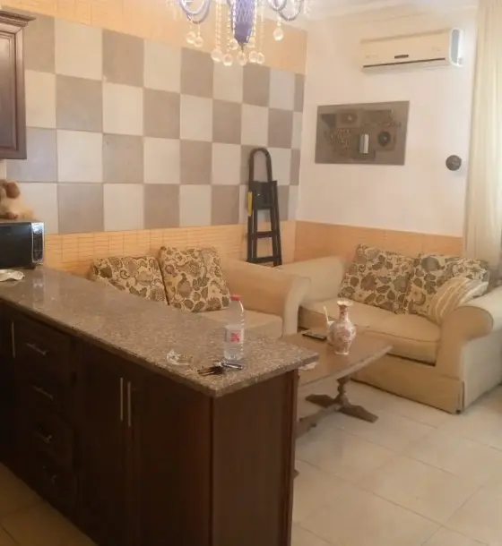 Monthly or yearly in Al Kursi: furnished semi-ground 2-bed flat