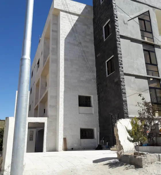 For newlyweds in Telaa Al Ali: renovated, unfurnished 2-bed flat