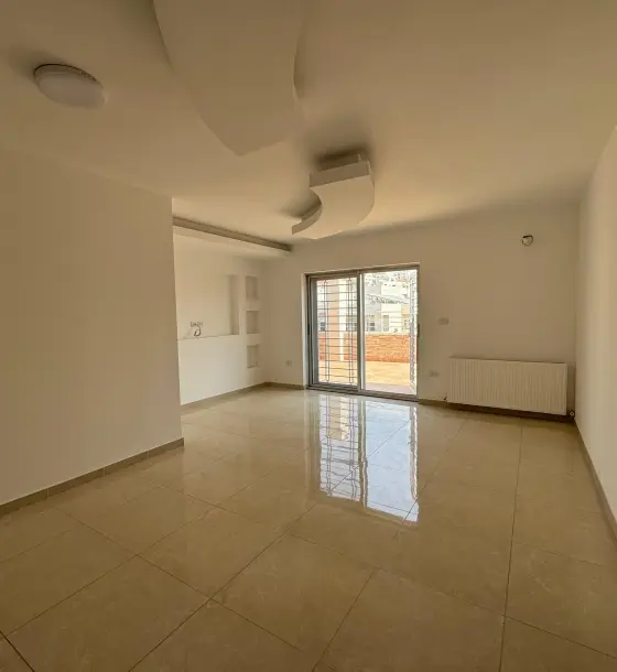 Off Airport Road in Dahyet Al Nakheel: 120 m² roof flat with 80 m² of terraces, yearly rent