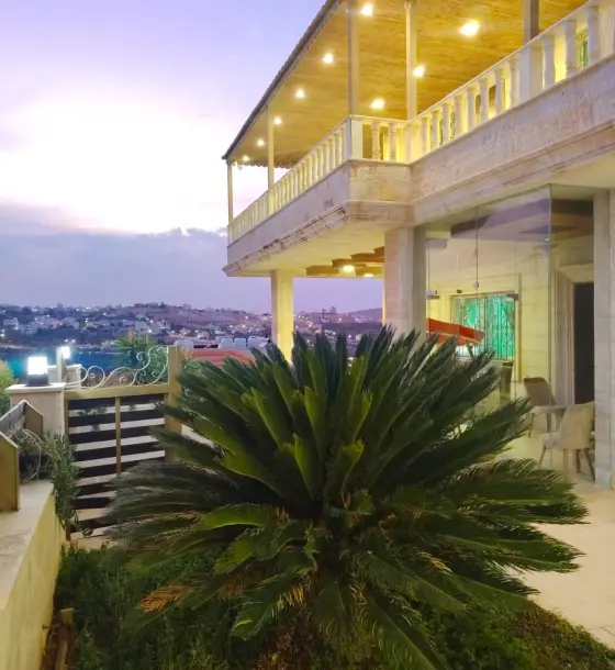 Uyoun Al Theeb three-floor villa in Shafa Badran with a view terrace and outdoor seating