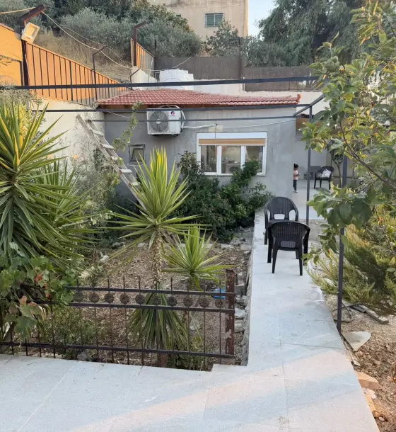 Abu Nsair Residential C plot of 605 m² with a fitted private chalet