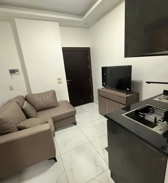 Private terrace and garage with a small furnished 1-bedroom flat at Al Lawazem Circle, Irbid