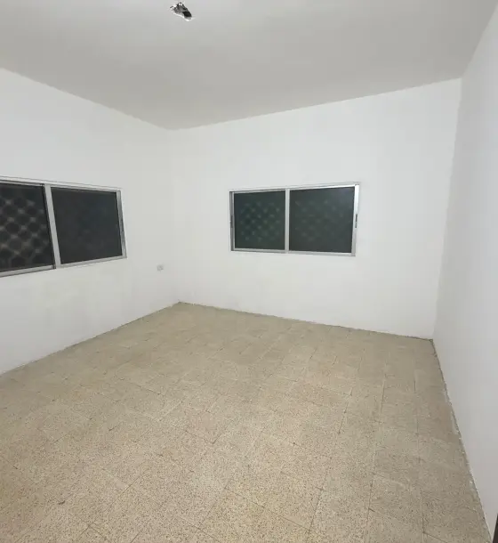 Behind 36th Street in New Zarqa: freshly painted 3-room flat for rent