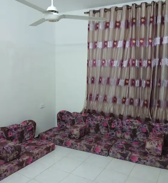 Monthly rent in Al Zawahra, Zarqa: furnished two-bedroom flat with a salon
