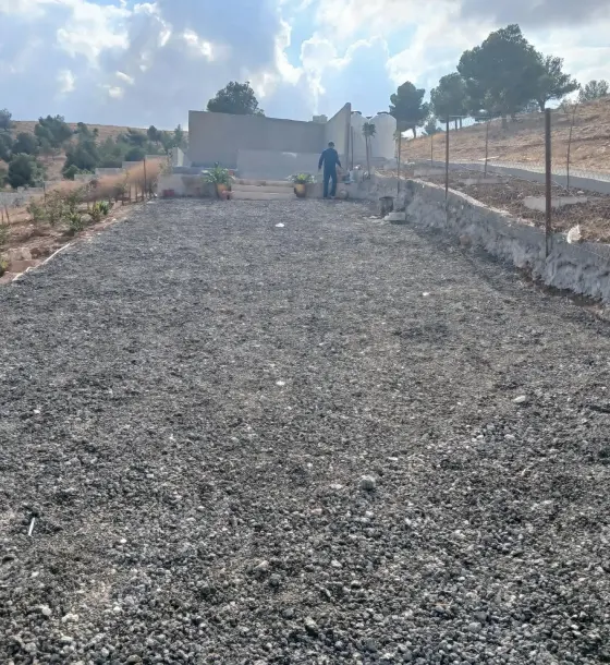 Two plots, one dunum, fenced and planted on two streets in Birayn (Umm Fatayer)