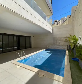 Semi-Furnished Rooftop Apartment for Rent – Abdoun #10768